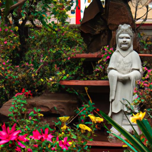 Tượng Phật Bà Quan Âm Trong Khu Vườn Được Bao Quanh Bởi Hoa Và Cây Cỏ